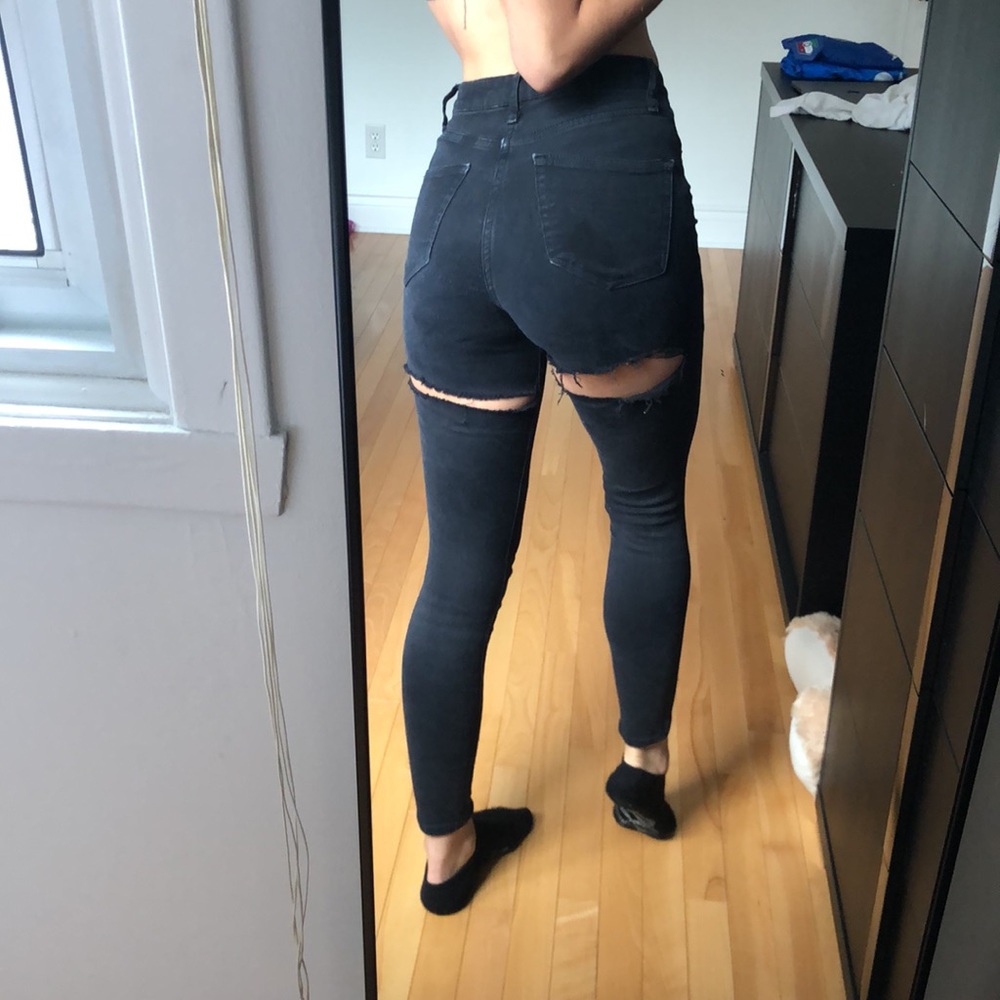 Topshop black jeans with cuts under bum